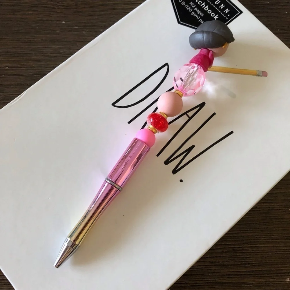Disney Doorables: Encanto: Alma Madrigal handmade beaded pen